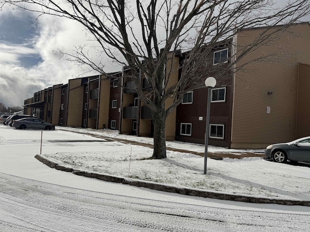 view of snow covered property