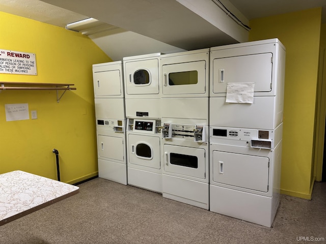 clothes washing area featuring stacked washer / drying machine and independent washer and dryer