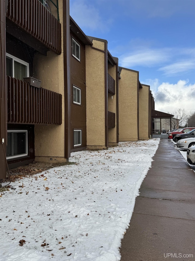 view of snow covered building