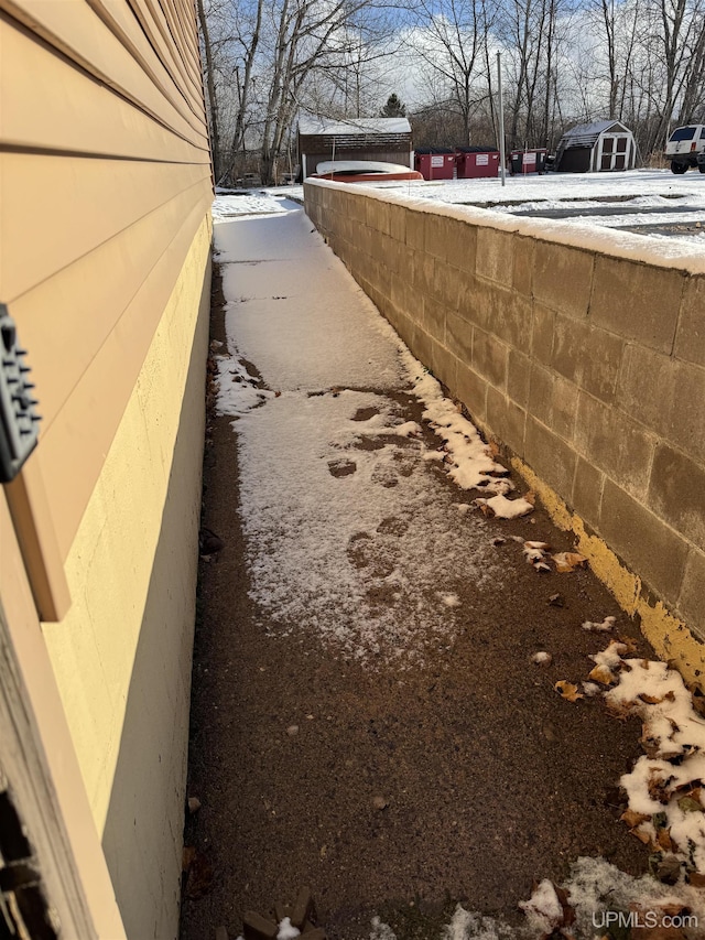 view of yard layered in snow