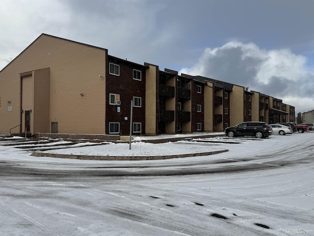 view of snow covered property