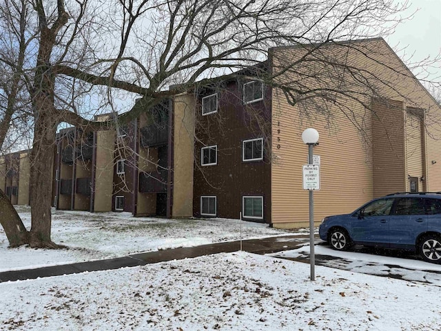 view of snow covered property