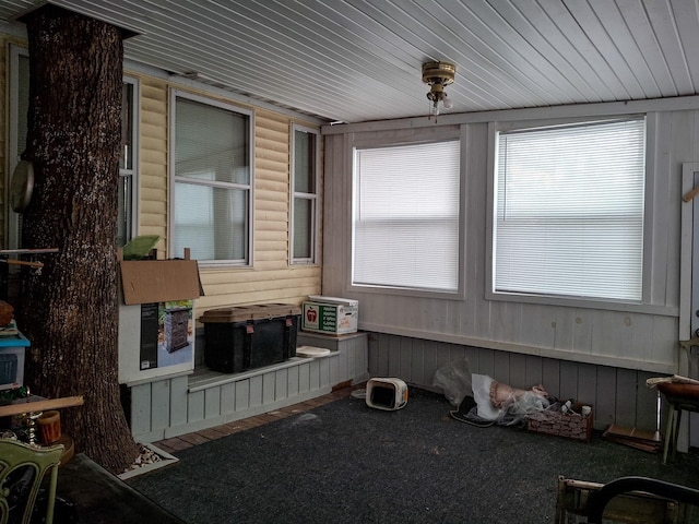 sunroom with wood ceiling