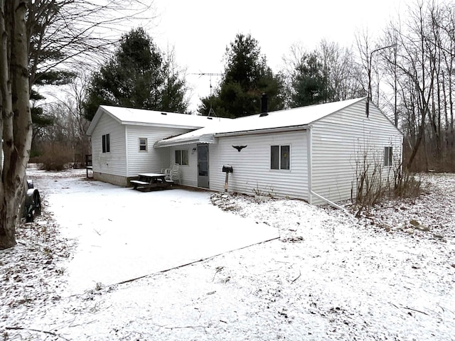 view of snow covered property