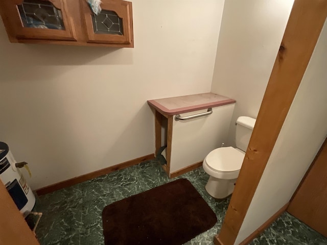 bathroom featuring toilet