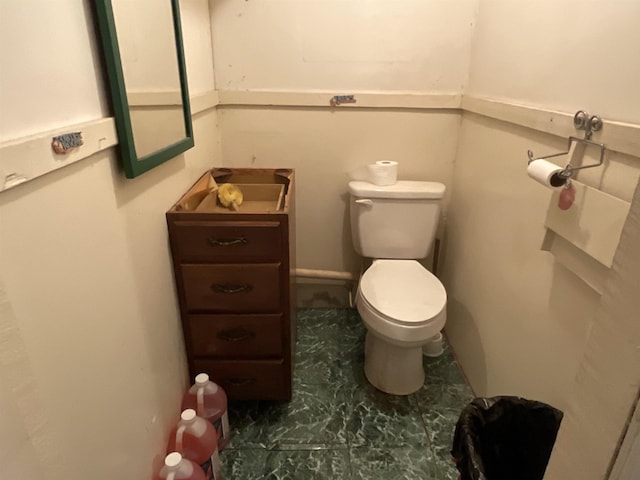 bathroom featuring toilet