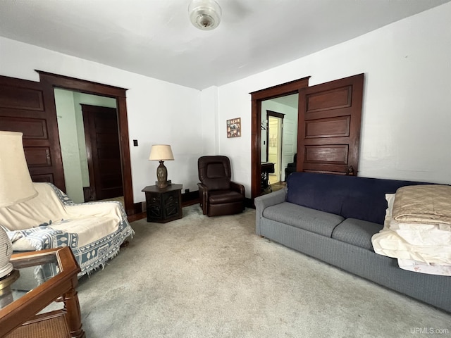 living room featuring light colored carpet