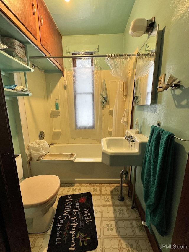 full bathroom with shower / bathing tub combination, toilet, and sink