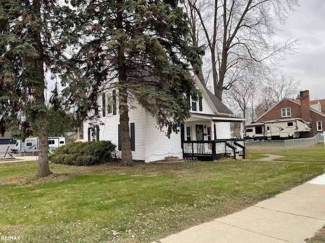 exterior space with a front lawn and covered porch