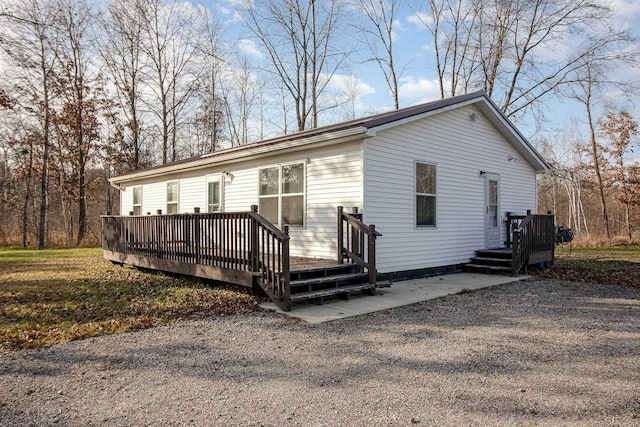 view of front of house featuring a deck