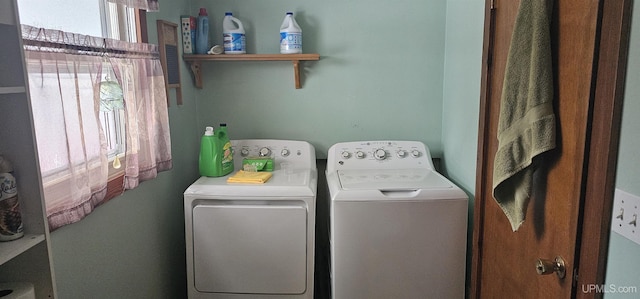 laundry room featuring washer and clothes dryer