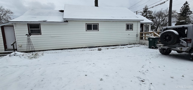 view of snow covered property