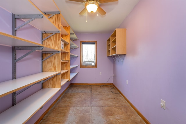 storage room with ceiling fan