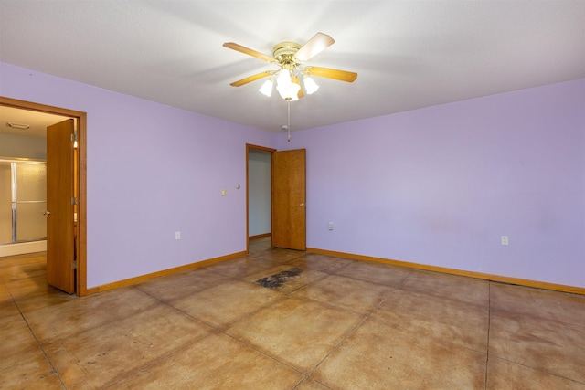 unfurnished room with ceiling fan