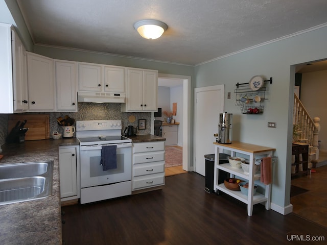 kitchen with sink, dark wood-type flooring, white electric range, white cabinets, and ornamental molding