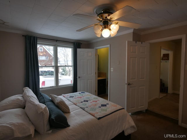 bedroom with carpet, ceiling fan, and ornamental molding