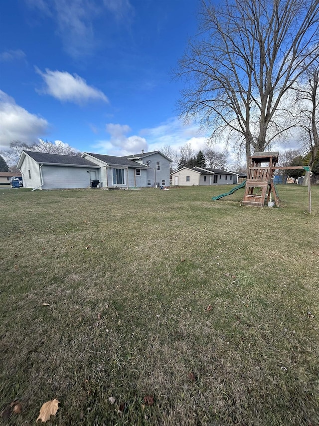 view of yard with a playground