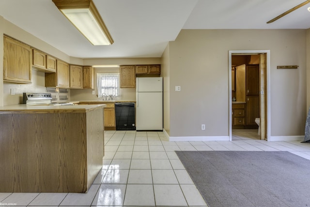 kitchen with kitchen peninsula, white appliances, ceiling fan, sink, and light tile patterned floors