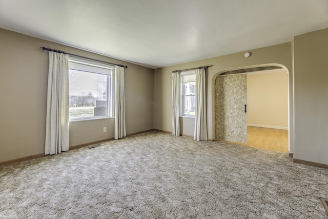 empty room featuring carpet flooring