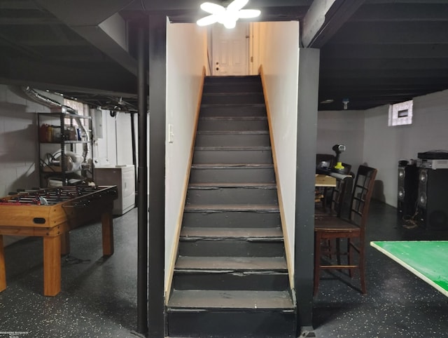 staircase with washer / dryer