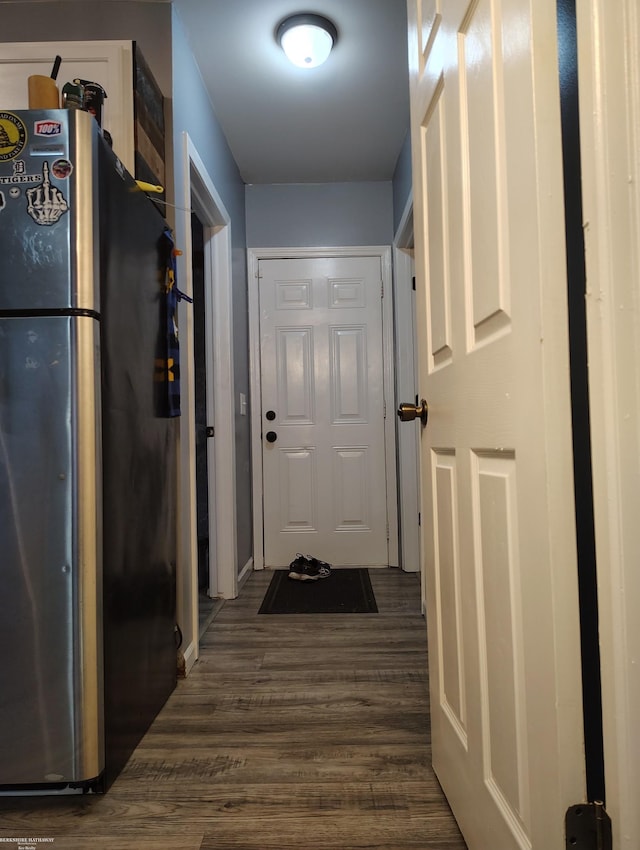 hall with dark hardwood / wood-style floors