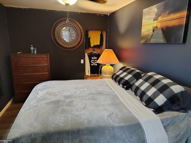 bedroom featuring dark hardwood / wood-style floors