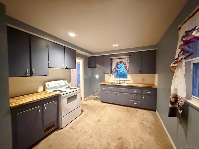 kitchen featuring light carpet, sink, white electric range oven, and wooden counters