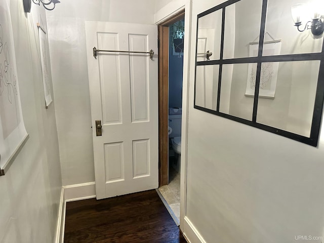 hall featuring dark hardwood / wood-style floors