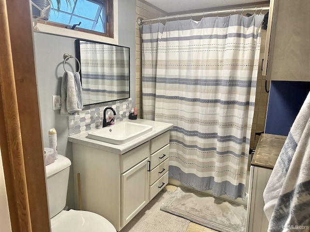 bathroom with decorative backsplash, vanity, tile patterned floors, and a shower with shower curtain