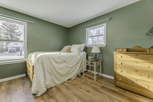 bedroom featuring hardwood / wood-style floors