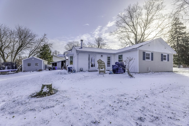 view of snow covered property