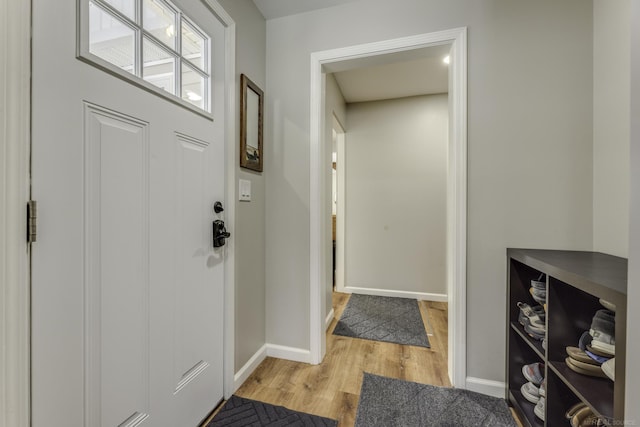 foyer entrance featuring light wood-type flooring