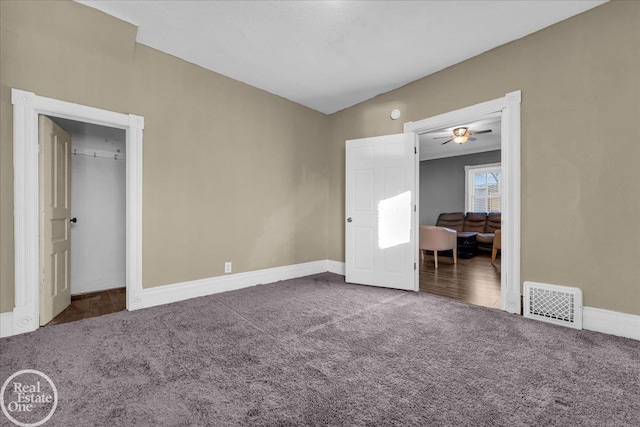 unfurnished bedroom with carpet flooring