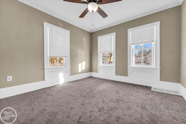 empty room with carpet and ceiling fan