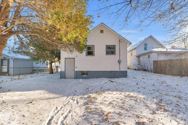 view of snow covered property