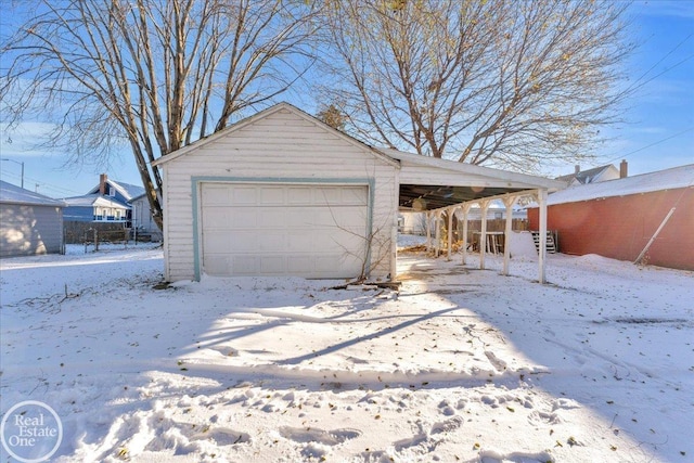 view of snow covered garage