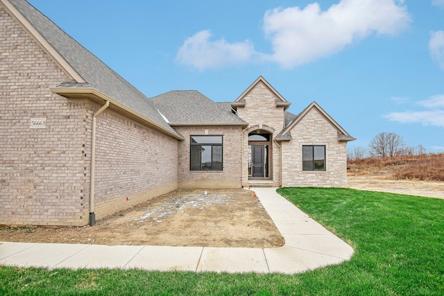 view of front of house with a front yard