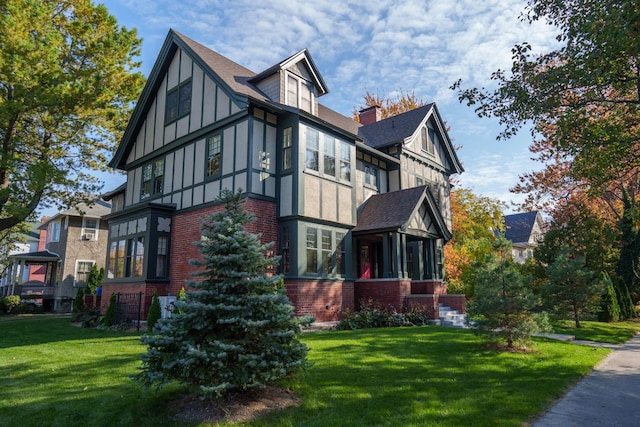 view of home's exterior featuring a lawn