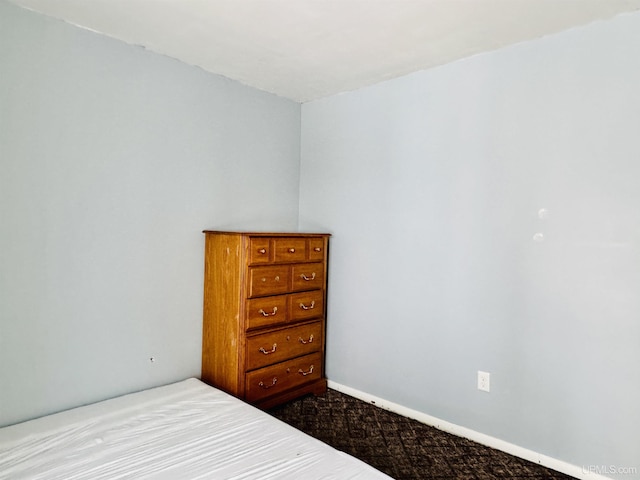 bedroom with light carpet