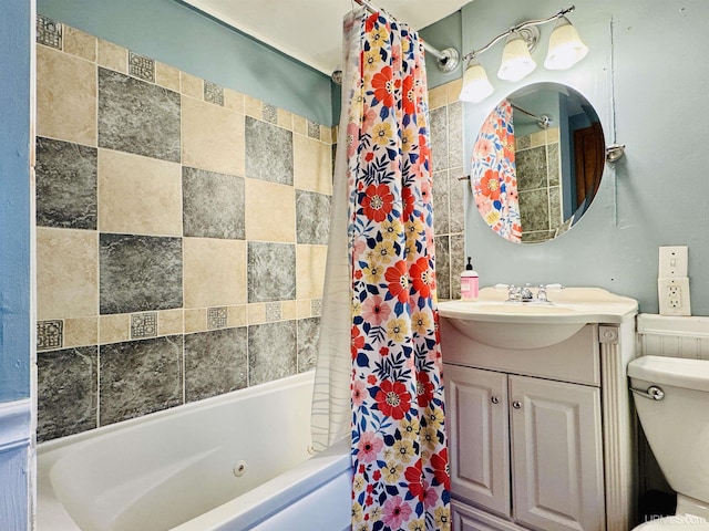 full bathroom featuring vanity, shower / bath combination with curtain, and toilet