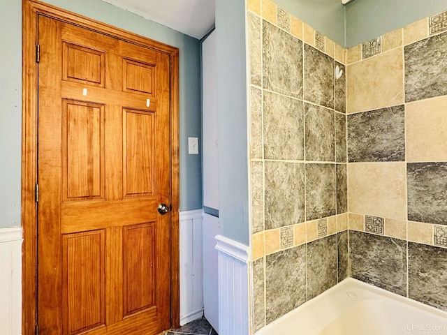 bathroom featuring a tub