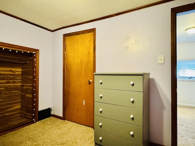 unfurnished bedroom featuring light colored carpet and ornamental molding