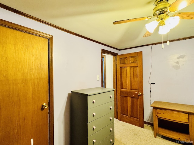 bedroom featuring carpet flooring, ceiling fan, and ornamental molding