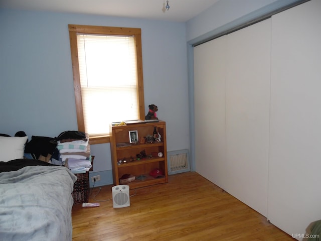 bedroom featuring light wood-type flooring