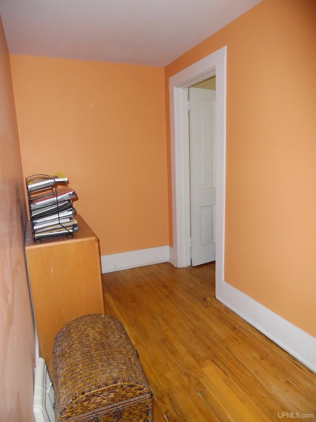 hallway featuring hardwood / wood-style floors