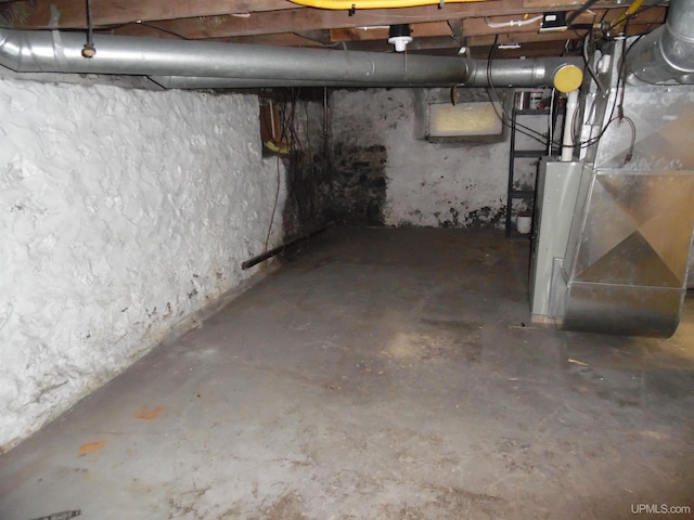 basement with heating unit