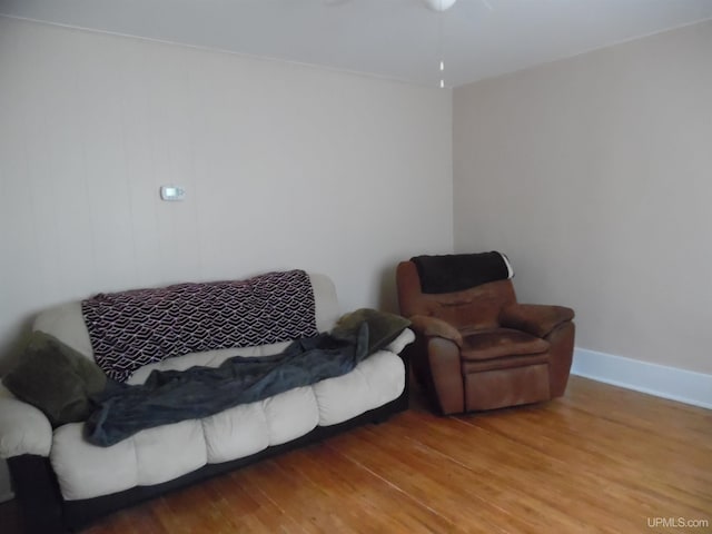 sitting room with hardwood / wood-style floors