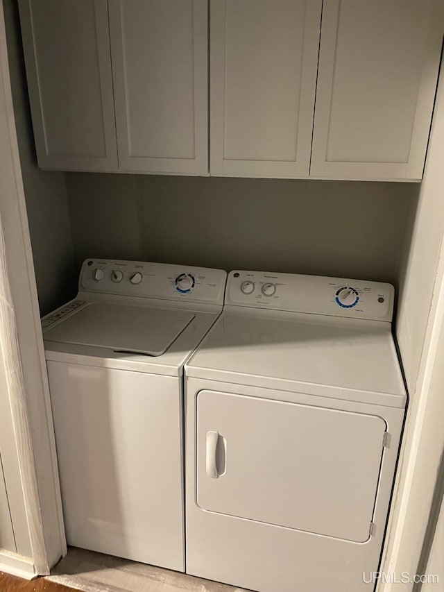 washroom with washer and clothes dryer