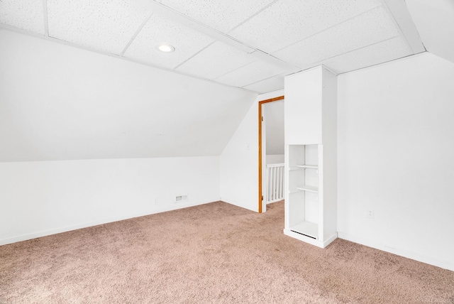 bonus room with carpet and lofted ceiling