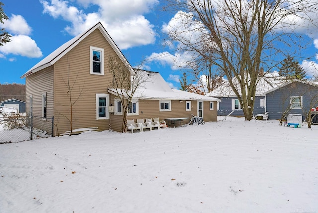 view of snow covered house